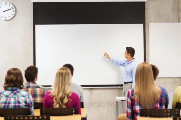 A man is giving a presentation to an audience.