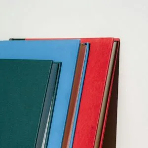 a stack of books sitting next to each other